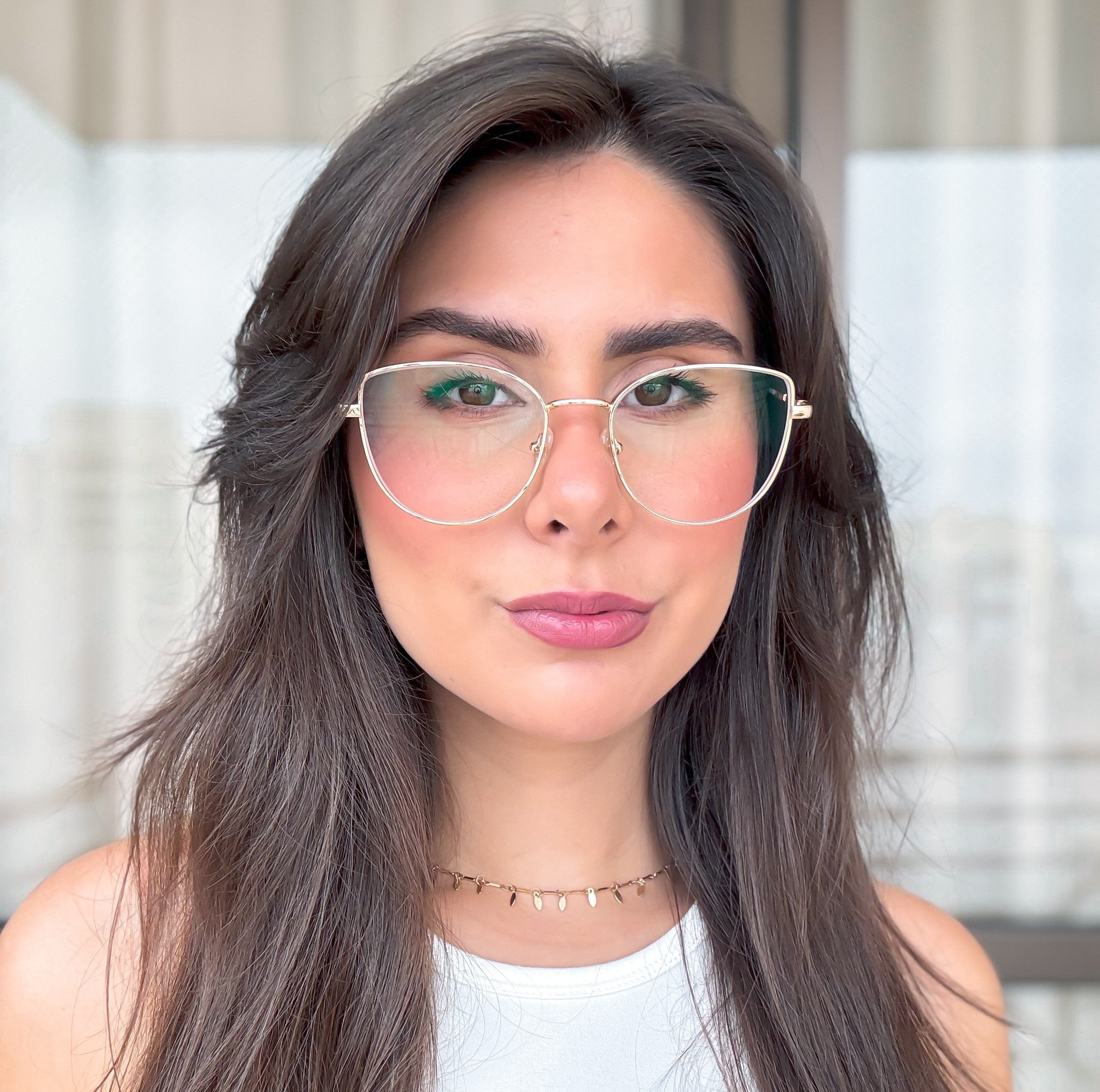 files/Oculos_de_grau_kessy_315_classico_dourado_rosto_7119652b-0902-4618-b19a-e613d6e0b4cd.jpg
